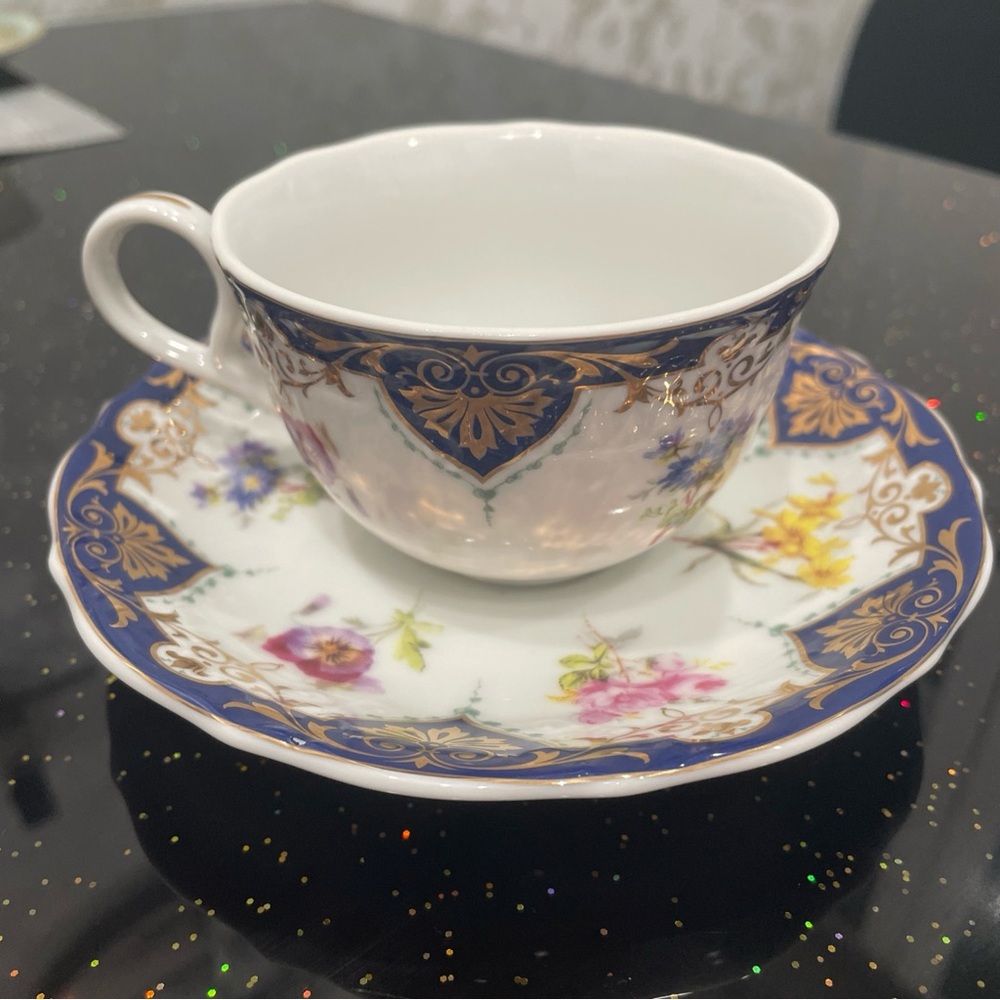 Elegant Blue and Gold Floral Teacup and Saucer Set. Japan, handpainted.